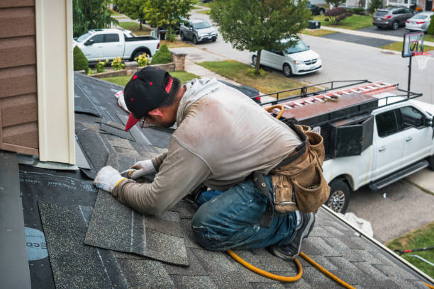 Professional Flat Roof Repair technician working in Bellevue, OH